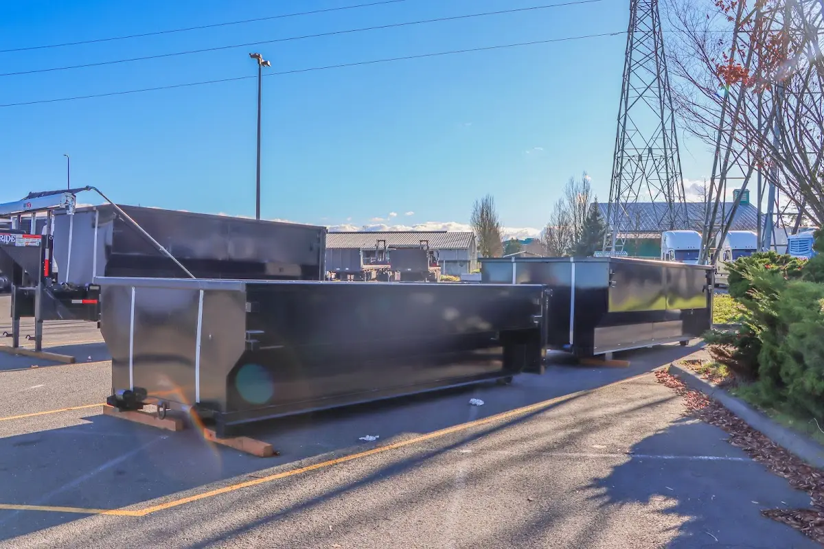 Roll-off dumpster ready for waste disposal at job site for Construction Dumpster Rental in Grandwood Park